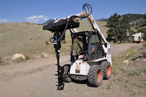 post hole digger attachment for a gehl skid steer|truck mounted post hole digger.